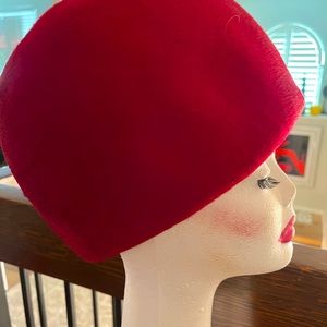 This is a  red beehive wool hat  from the 60s.